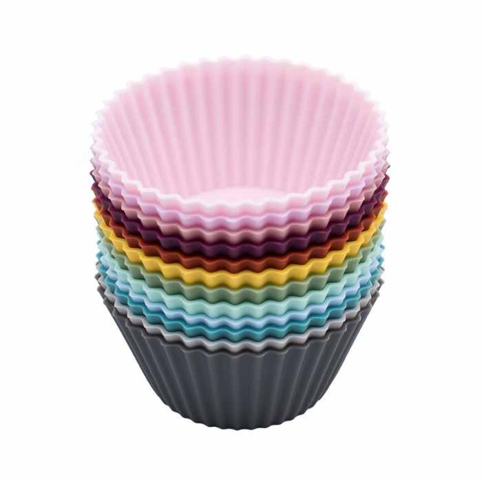 Colourful stack of twelve non-stick muffin cups showing ripple edge